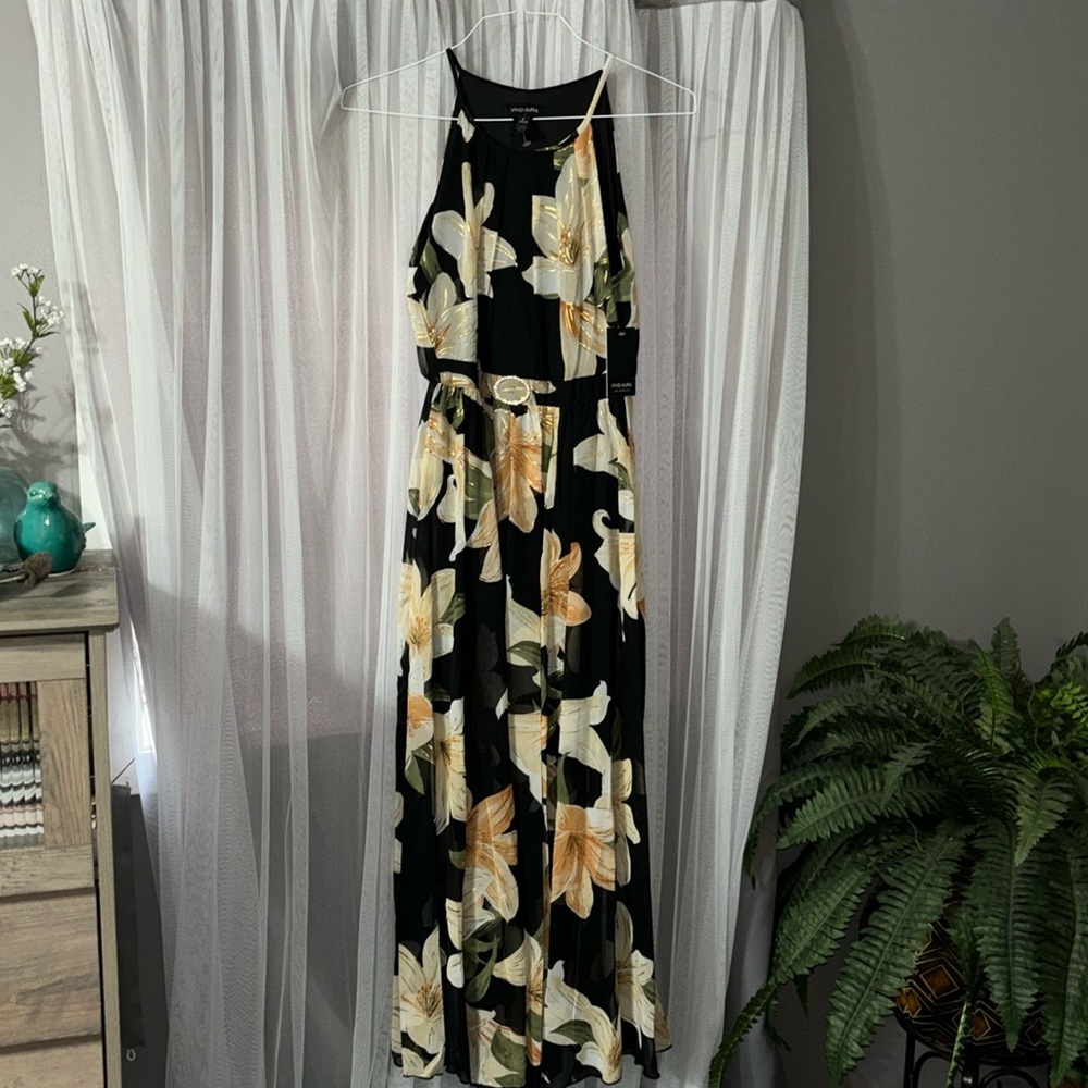 Sexy, vibrant, floral, flowy, long dress with diamond accent!